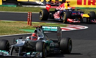 Гран При Японии 2012 г. Суббота 6 октября третья практика Михаэль Шумахер Mercedes AMG Petronas и Себастьян Феттель Red Bull Racing