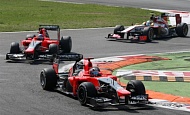 Гран При Италии 2012 г. Воскресенье 9 сентября гонка Тимо Глок, Шарль Пик  Marussia F1 Team и Нараин Картикеян HRT F1 TEAM