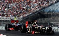 Гран При США  2012 г. Воскресенье 18 ноября гонка Кими Райкконен Lotus F1 Team и Льюис Хэмилтон Vodafone McLaren Mercedes