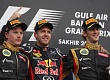Гран При Бахрейна  2012 г  воскресенье 22 апреля победитель гонки Себастьян Феттель Red Bull Racing, Кими Райкконен и Ромэн Грожан Lotus F1 Team