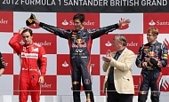 Гран При Великобритании  2012 г Воскресенье 8 июля гонка Фернандо Алонсо Scuderia Ferrari, Марк Уэббер  и Себастьян Феттель Red Bull Racing