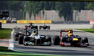 Гран При Италии 2012 г. Воскресенье 9 сентября гонка Нико Росберг Mercedes AMG Petronas и Марк Уэббер Red Bull Racing