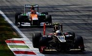 Гран При Италии 2012 г. Воскресенье 9 сентября гонка Жером Дамброзио Lotus F1 Team и Нико Хюлкенберг Sahara Force India F1 Team