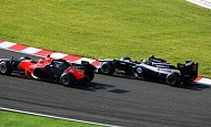 Гран При Японии 2012 г. Воскресенье 7 октября гонка Шарль Пик Marussia F1 Team и Бруно Сенна Williams F1 Team