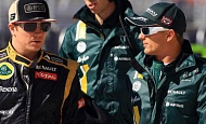 Гран При США 2012 г. Пятница 16 ноября вторая практика Кими Райкконен Lotus F1 Team и Хейкки Ковалайнен Caterham F1 Team